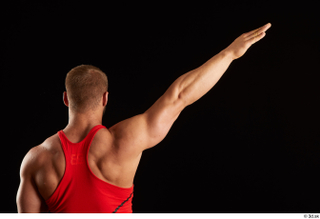 Dave  1 arm back view dressed flexing red tank…